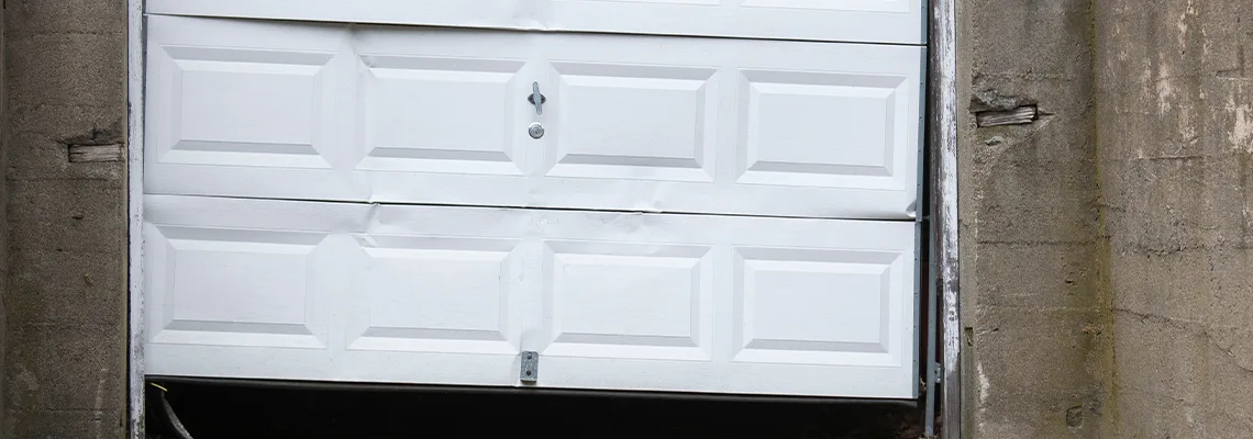 Garage Door Got Hit By A Car Dent Removal in Cutler Bay, FL
