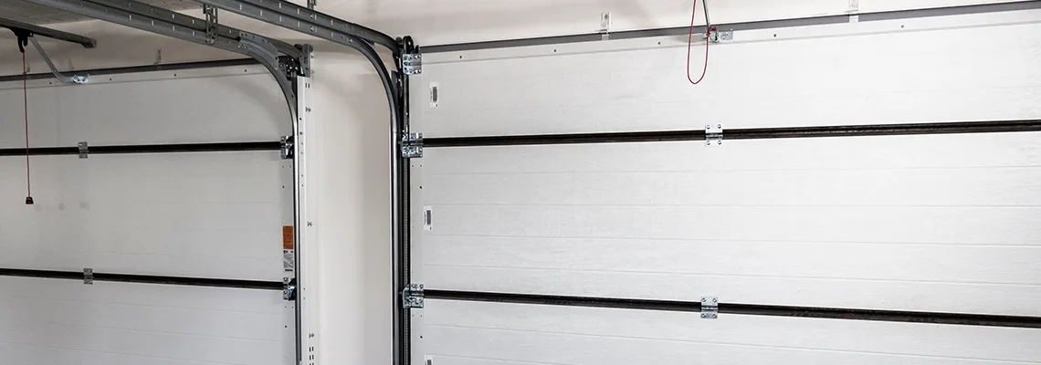 Fix Folding Garage Door Jerking in Cutler Bay