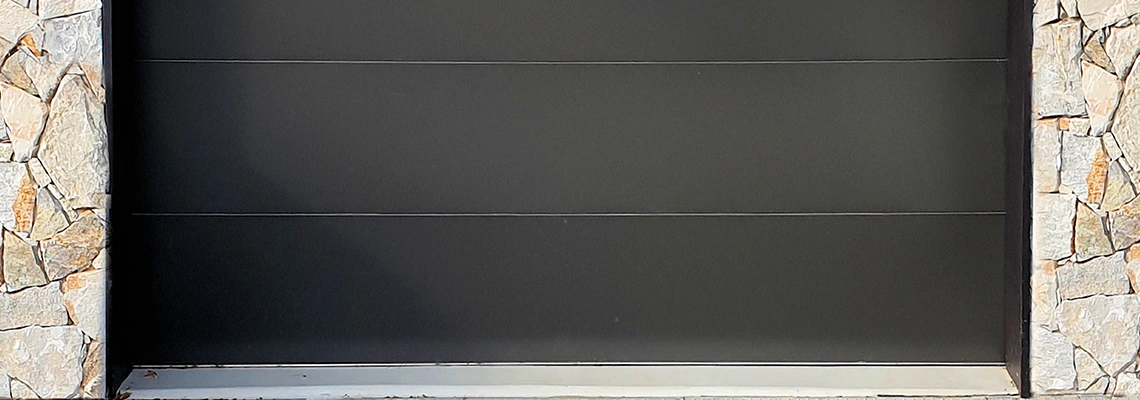 Overhead Black Garage Door Installation in Cutler Bay, Florida